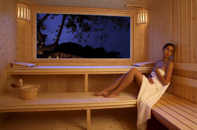 image of a lady in a sauna